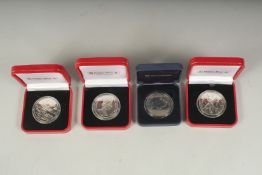 POBJOY MINT. FOUR VARIOUS SILVER COINS, boxed.