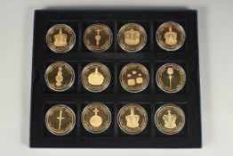 THE CROWN JEWELS COIN COLLECTION. TWELVE SILVER GILT COINS. No. 0144, boxed.