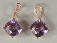 A PAIR OF 18CT GOLD AMETHYST EARRINGS in an R F Jewells box
