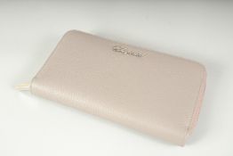 A CHOPPARD LEATHER PURSE.