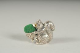 A SILVER SQUIRREL PIN CUSHION. 2.5cm.