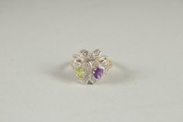 A SILVER GOLD PLATED SWEETHEART RING.