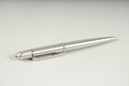 A CARTIER CHROME BALL POINT PEN.