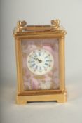 A MINIATURE FRENCH SEVRES DESIGN PINK CLOCK. 2.52ins.