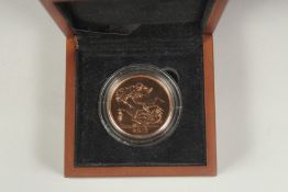 THE 2011 UK SOVEREIGN, £5.00 BRILLIANT, UNCIRCULATED GOLD COIN. No. 128. Boxed.