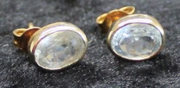 Pair of 14ct gold aquamarine earrings marked 585, 2.31g