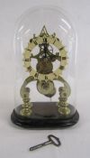 Skeleton clock with glass dome and key approx. 33cm high from floor to top of dome