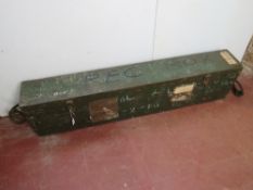 A British Bren transit box with carry handles, some stencilling visible.