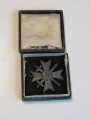 A WWII German War Merit with swords in box.