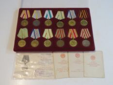 Twelve Soviet Medals and ribbons and four citations, inc the Defence of Moscow,