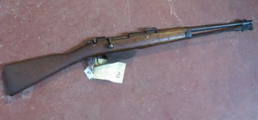 A deactivated Carcano M91/38 6.5mm carbine and FNA-B manufacture.