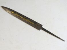 A German Damascus blade with gold writing.