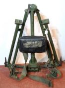 A DISA Tripod with carry straps.