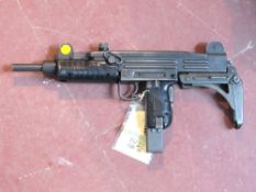 A deactivated Uzi 9mm sub machine gun.