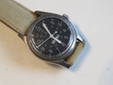 Hamilton Watch Khaki Field Officer Handwinding with original strap, in working condition.