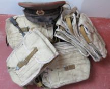 A quantity of WWII Maxim gunners pouches with a Soviet Visor cap and gunners tool.