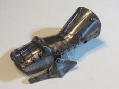 An early Victorian copy of a 15thC armour gauntlet.