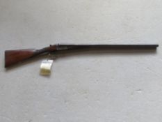A deactivated US Stevens model 311 double barrel 12 gauge boxlock shotgun. Engraved A.