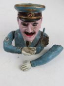 A contemporary reproduction cast iron Hitler moneybox. A/F.