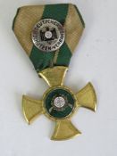 A Third Reich marksmanship medal in gold colour.