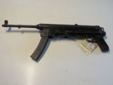 A deactivated Yugoslav M56 7.62mm sub machine gun.