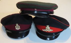 Two British Visor caps and a soviet cap, being a British Womens Royal Artillery size 57,