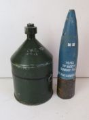 An inert Drill HE sub shaped charge together with an inert 76mm Malara Naval TP MOD79 cannon