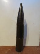 An inert WWII German 10CM shell with head, K18 Cannon, dated 1935, bearing stencilling on the head,