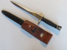 A bayonet With F+W marking and V 434798 upon Spearpoint Blade, composition grip, with scabbard,