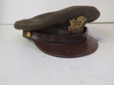 A US Officers Army regulation cap, size 7 1/8, dated 1942 with markings.