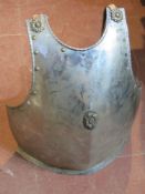 Decorative armour plate with straps.