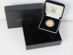 A 22ct gold proof sovereign in original Royal Mint presentation box, 2000 Millennium Gold number,