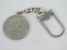 An HM silver key chain having Tudor Rose design upon, 26.3g.