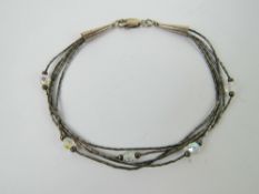 A Native American Navajo style silver bead and crystal bracelet,