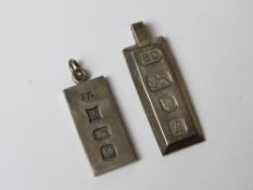 Two HM silver ingots, one having London hallmark,