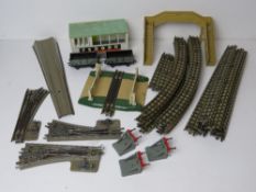 A quantity of Triang Solid 00HO gauge railway track together with sprung buffers,