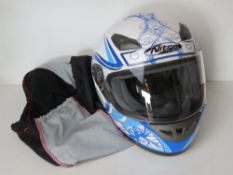 A Nitro Racing motorbike helmet size M in dust bag.