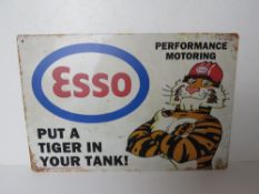 A contemporary metal garage Esso advertising sign 'Put a tiger in your tank', 30 x 20cm.