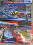 Two slot car racing sets being Disney Pixar Cars and Drifting Express in play worn condition.