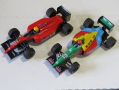 A Scalextric Formula One race track, box a/f, having two cars and two controllers within.