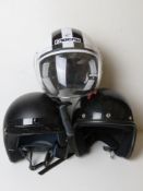 Three motorcycle helmets. For decorative purposes only, not tested for road use.