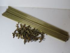A set of fifteen stairs carpet rods with fittings, each rod measuring 78.5cm in length inc finials.