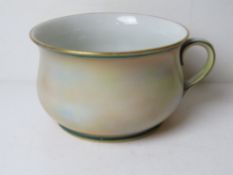 A Worcester chamber pot in blush ground and having puce backstamp.