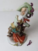 A Capo di Monte musketeer, a/f, standing approx 30cm high.