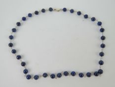 A lapis lazuli bead necklace having 925 silver clasp and measuring 41.5cm in length.