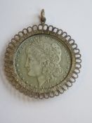 An 1896 United States of America one dollar coin, loose mounted in pendant.
