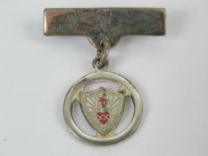 A HM silver Sacred Heart enamelled brooch, 3cm in length.