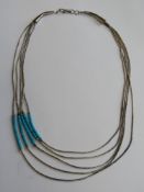 A sterling silver Native American Navajo style necklace,