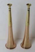 A fine pair of copper and brass hunting horns, 22cm in length.