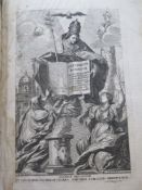 A large leather-bound bible dated 1782 to the frontispiece and in Latin having leather-bound wooden